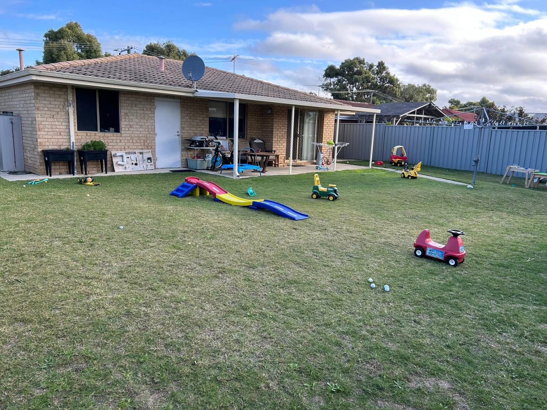 Before photo — Backyard tidy in Rockingham — toys put away, lawn mowed, edges and paths cleared down. in Rockingham